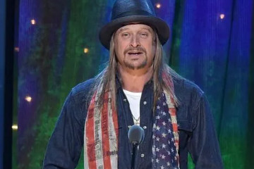 电摇小子背后的故事，是美国歌手kidrock(风格多样流派模糊)